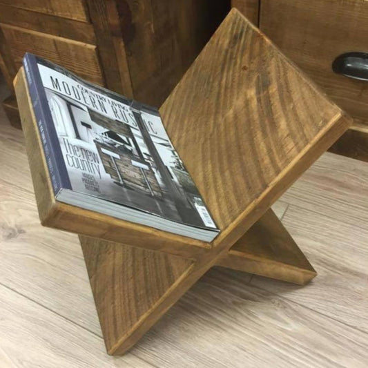 Handmade rustic wooden magazine rack for storing newspapers, books, and magazines, crafted by Spire Carpentry UK.
